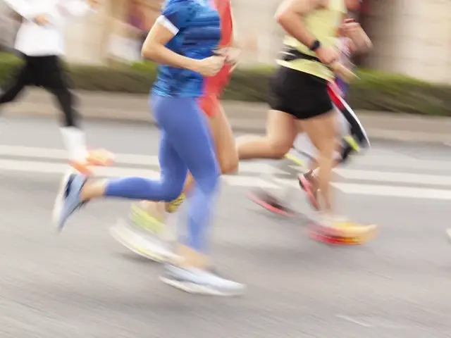 Coureurs sur route lors d'une séance de running loisir